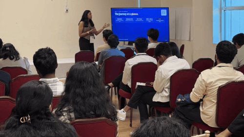 GoElite presents CPT and OPT guidance to international students during the Open Atlas Summit in California.